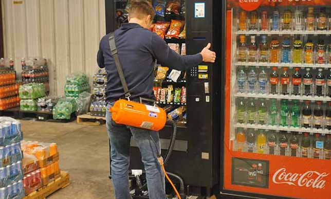 Using Airsled’s adjustable spacers to move a vending machine on high legs