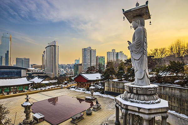Giant Buddha statue standing over Bongeunsa Temple in Seoul, Korea