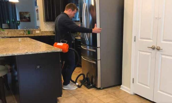 Airsled appliance mover moving a large refrigerator