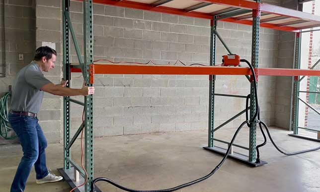 Using an airsled system to move a pallet rack